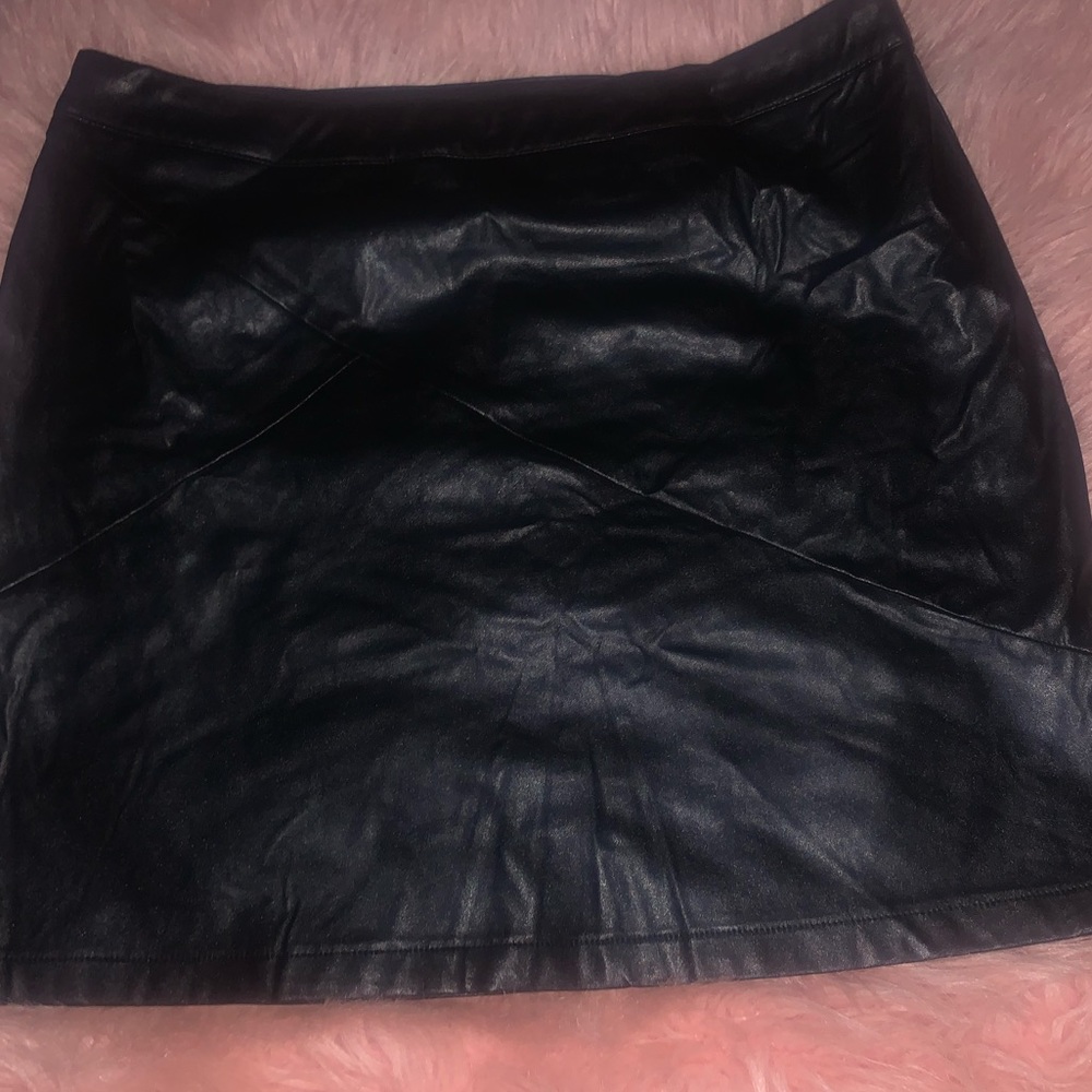 Black leather skirt a little wrinkled but in great condition wore once or twice